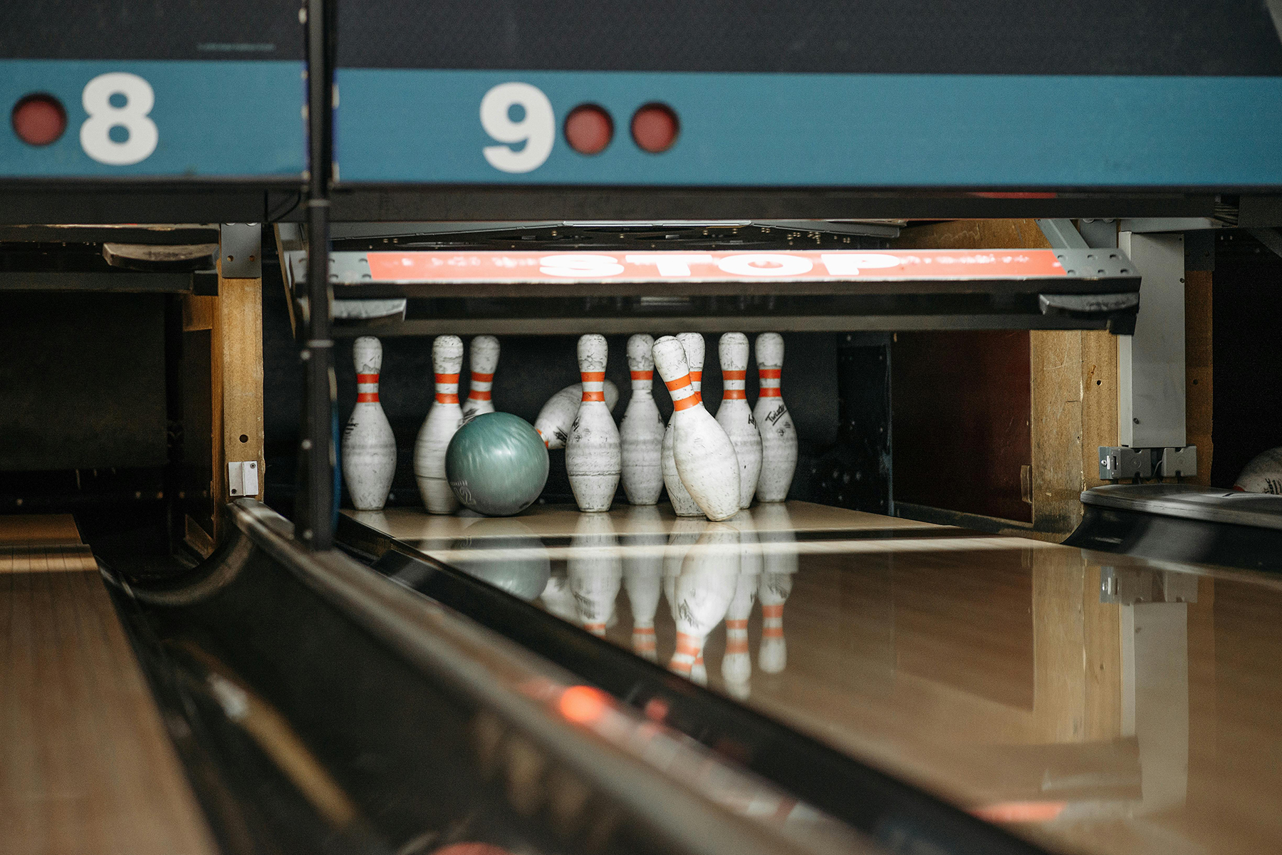 Bowling pins hit by ball during family night near Settlers Point Luxury RV Resort, by Pavel Danilyuk (https://www.pexels.com/@pavel-danilyuk)